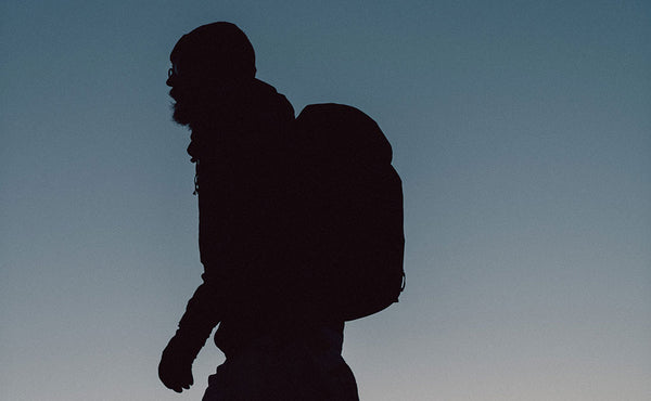 Silhouette of a person carrying the Original Shadow Guide 31.